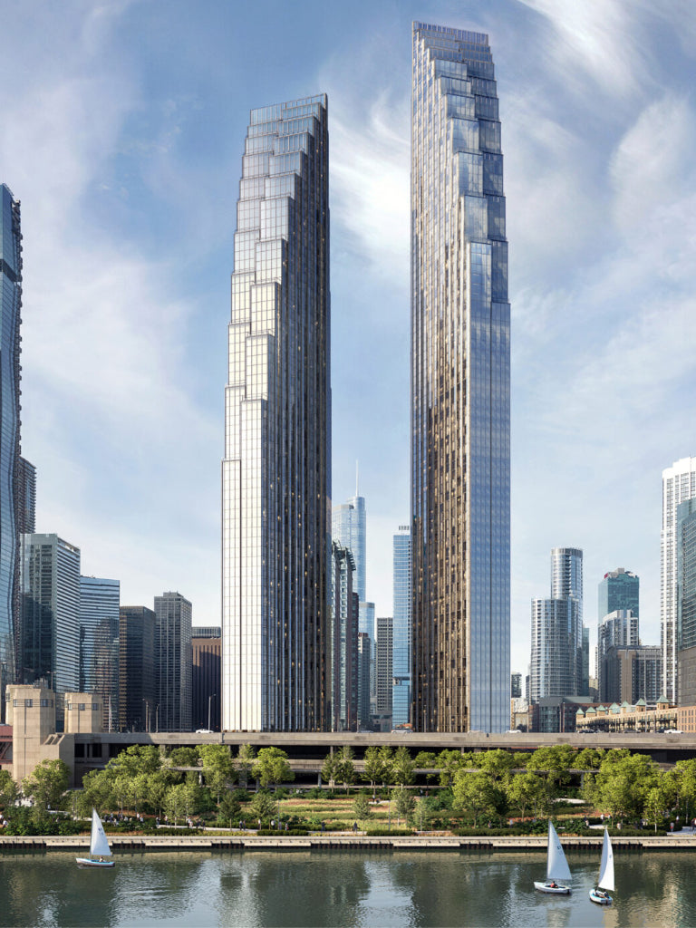 Tall glass skyscrapers in a cityscape with a river and boats. 400 Lake Shore drive