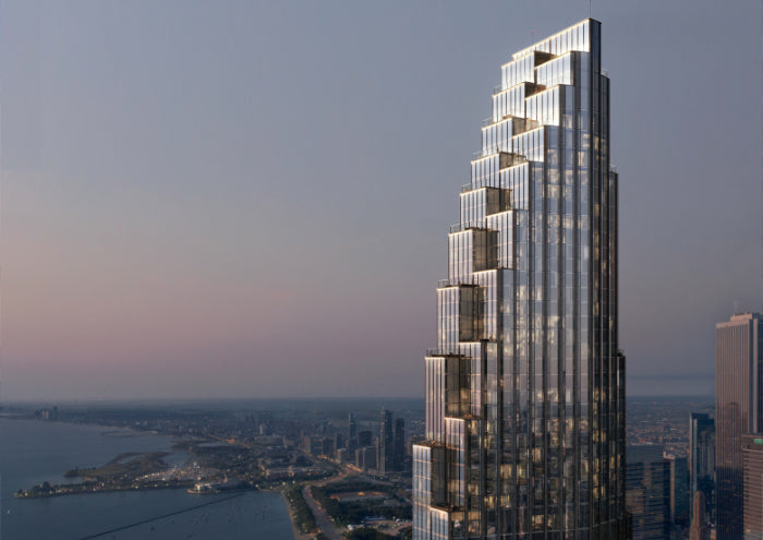 Tall skyscraper with a modern architectural design near a waterfront cityscape. Lake Shore Chicago.